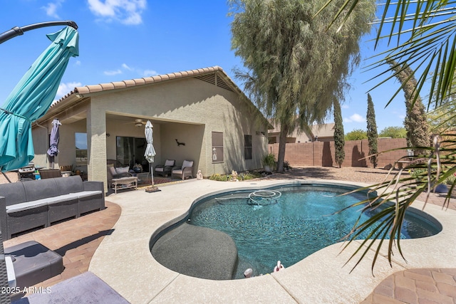 view of swimming pool featuring outdoor lounge area, a fenced backyard, a patio area, and a fenced in pool