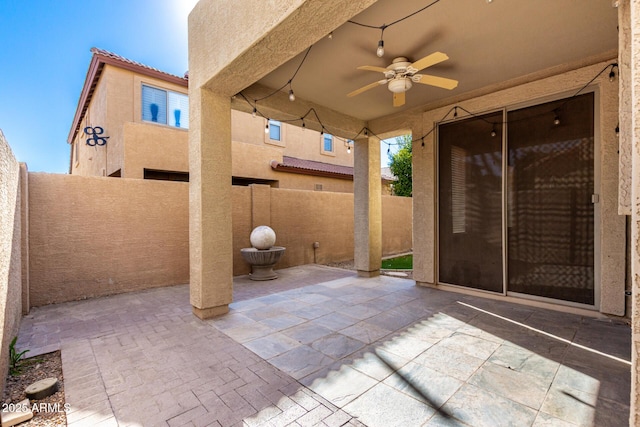 view of patio with ceiling fan