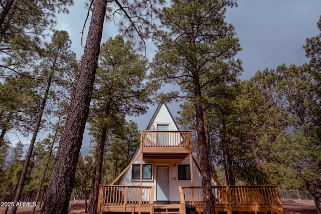 2124 Forest Park Dr, Overgaard, AZ 85933 - a-frame home featuring a balcony and a deck