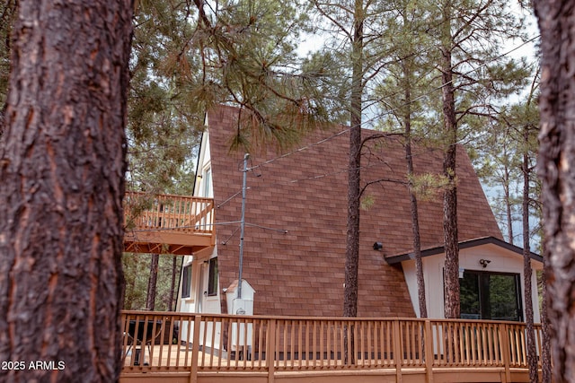 2124 Forest Park Dr, Overgaard, AZ 85933 - rear view of house with a deck and brick siding