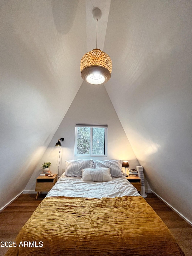 2124 Forest Park Dr, Overgaard, AZ 85933 - bedroom featuring vaulted ceiling and wood finished floors