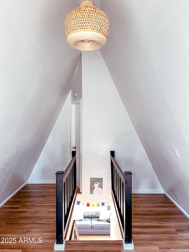 2124 Forest Park Dr, Overgaard, AZ 85933 - staircase with lofted ceiling and wood finished floors