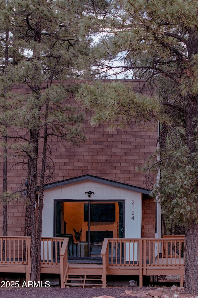 2124 Forest Park Dr, Overgaard, AZ 85933 - view of front of property featuring a wooden deck