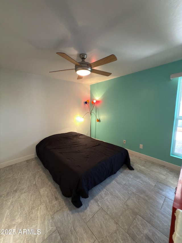 11035 N 37th St, Phoenix, AZ 85028 - bedroom featuring baseboards and ceiling fan