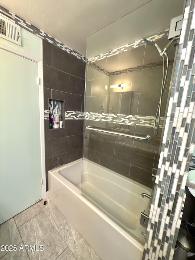 11035 N 37th St, Phoenix, AZ 85028 - full bath featuring visible vents, marble finish floor, and shower / bathing tub combination