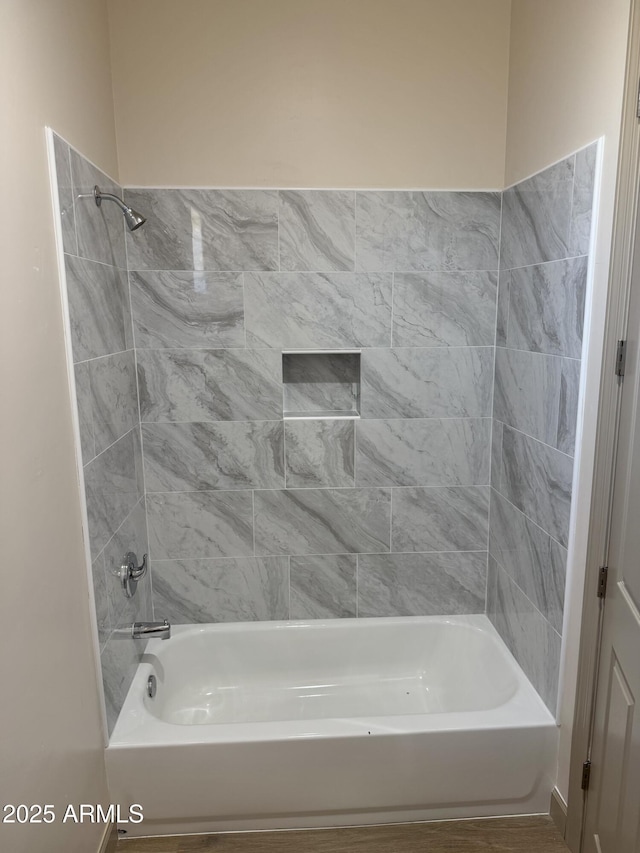 bathroom with shower / bath combination