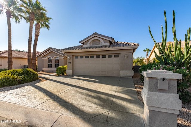 view of front of property with a garage