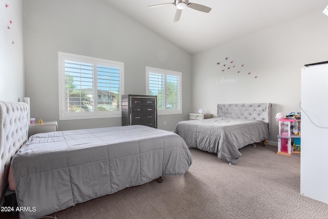 bedroom featuring multiple windows, high vaulted ceiling, carpet, and ceiling fan