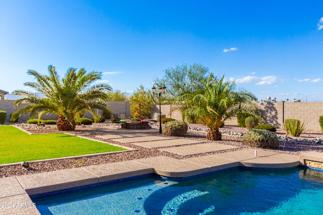 view of pool featuring a patio