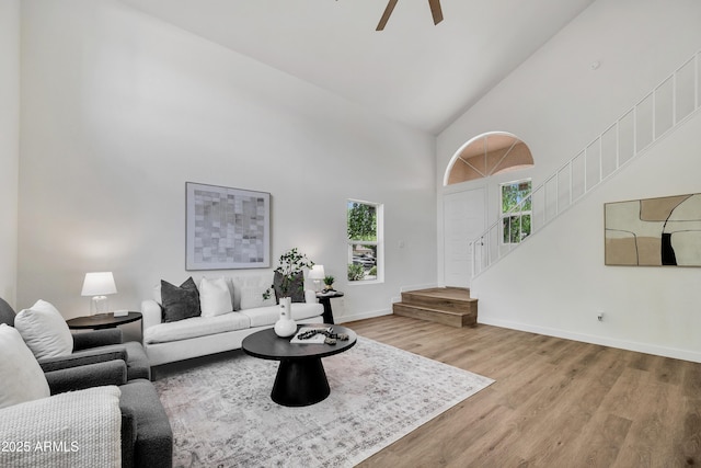 5122 W Mercury Way, Chandler, AZ 85226 - living area with high vaulted ceiling, wood finished floors, ceiling fan, and stairs