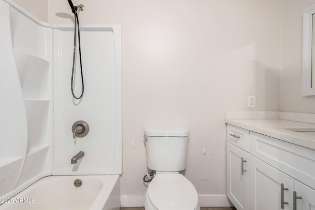 full bathroom featuring vanity, toilet, and washtub / shower combination