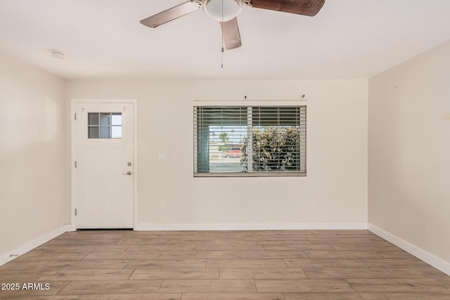 foyer featuring light hardwood / wood-style floors and ceiling fan