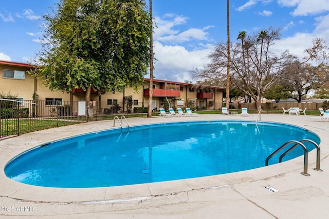 community pool with fence