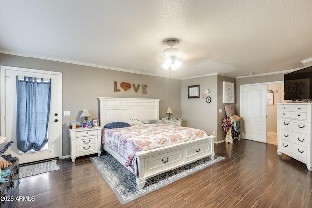 bedroom with dark hardwood / wood-style flooring, a textured ceiling, ornamental molding, and ceiling fan