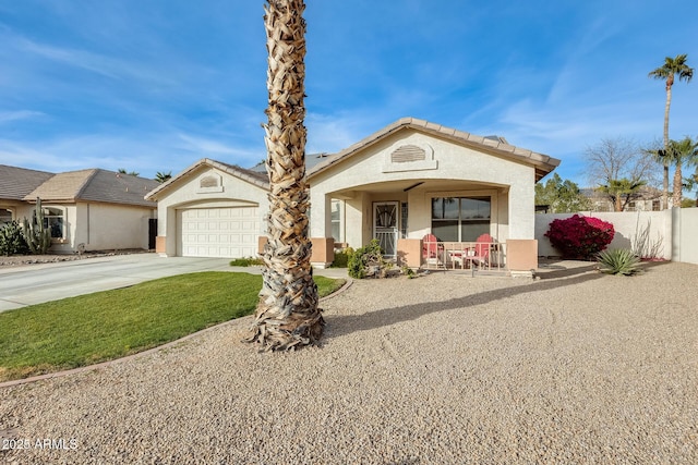 view of front of property with a garage and covered porch