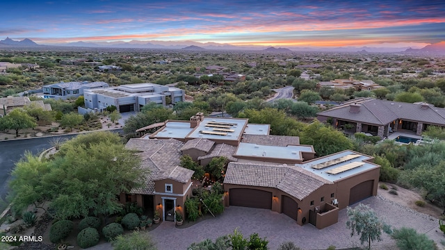 aerial view at dusk with a mountain view