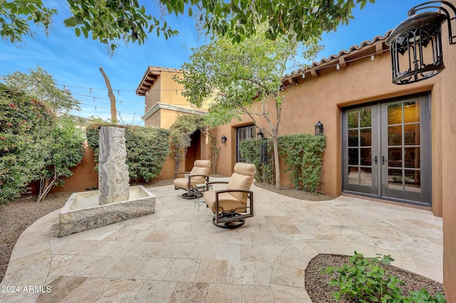 view of patio / terrace featuring french doors