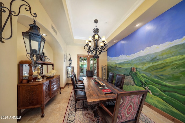 dining room with french doors, a chandelier, crown molding, and a tray ceiling