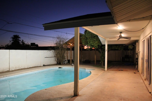 view of pool with a patio area, a fenced backyard, a ceiling fan, and a fenced in pool