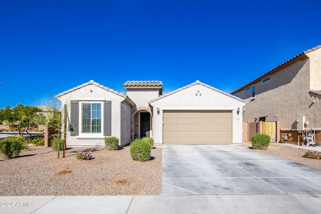 view of front of property with a garage