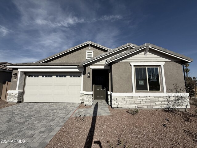 view of front of home with a garage