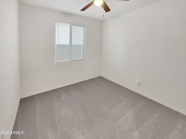 21081 W Almeria Rd, Buckeye, AZ 85396 - carpeted empty room featuring a ceiling fan and baseboards