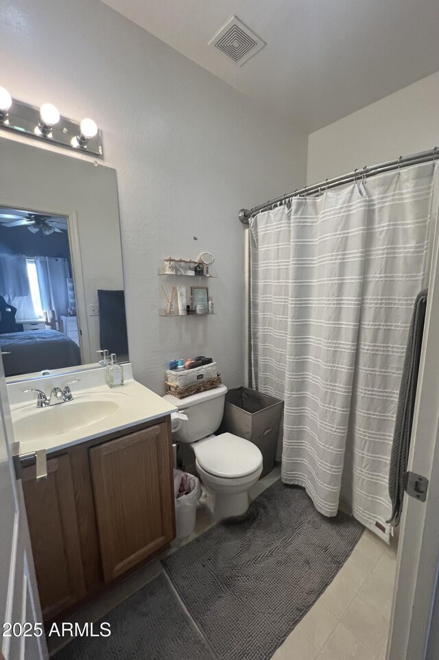 2311 E Hartford Ave Unit 38, Phoenix, AZ 85022 - full bathroom with vanity, a ceiling fan, and curtained shower