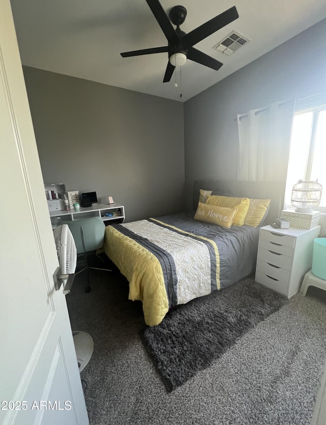 2311 E Hartford Ave Unit 38, Phoenix, AZ 85022 - bedroom with carpet floors and a ceiling fan