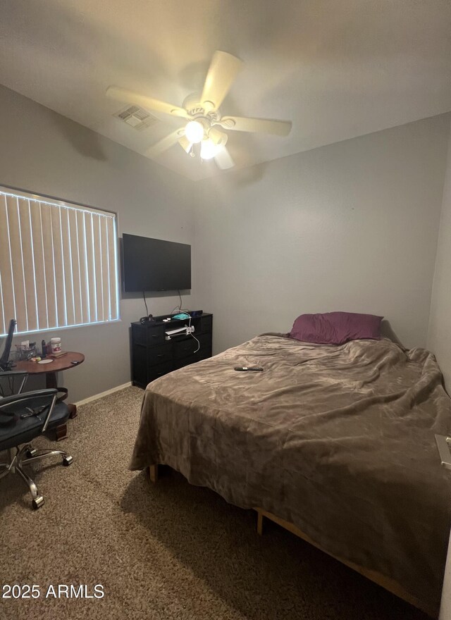 2311 E Hartford Ave Unit 38, Phoenix, AZ 85022 - carpeted bedroom featuring baseboards and ceiling fan
