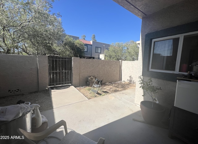 2311 E Hartford Ave Unit 38, Phoenix, AZ 85022 - view of patio / terrace with a gate