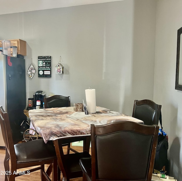 2311 E Hartford Ave Unit 38, Phoenix, AZ 85022 - dining room featuring wood finished floors