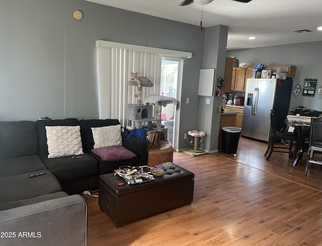 2311 E Hartford Ave Unit 38, Phoenix, AZ 85022 - living area with ceiling fan and light wood-type flooring