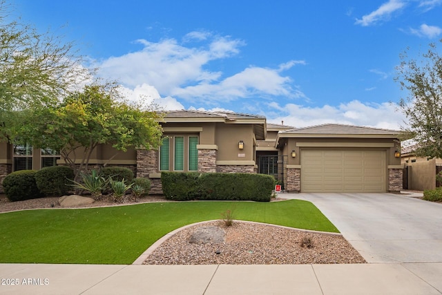 prairie-style house with an attached garage, driveway, stone siding, stucco siding, and a front lawn