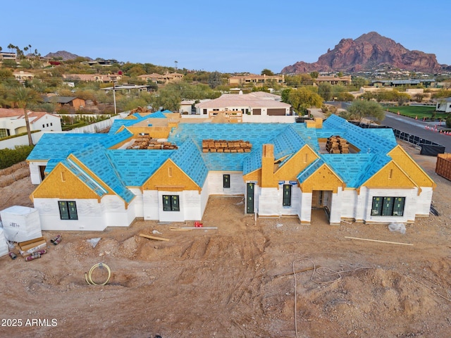 view of front of home with a mountain view