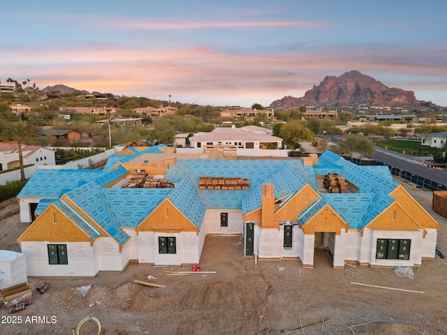 aerial view at dusk with a mountain view