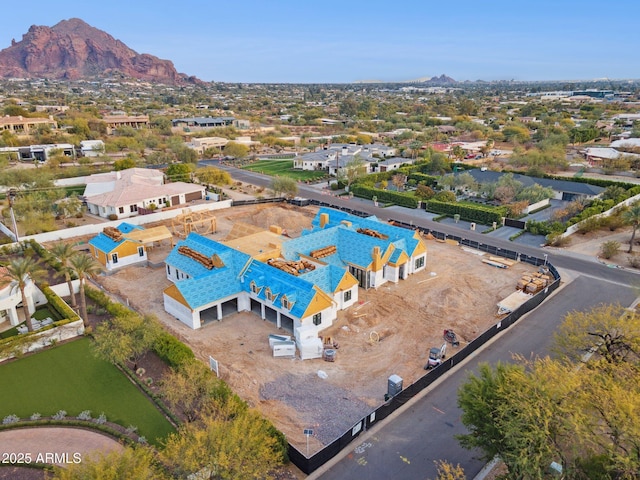 drone / aerial view with a residential view and a mountain view