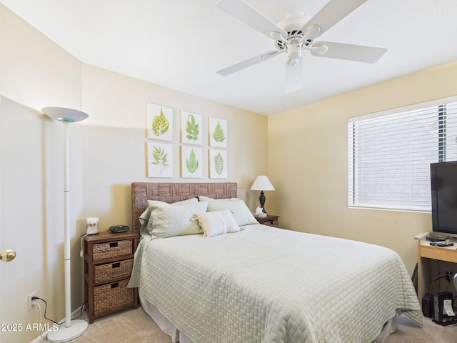 carpeted bedroom with a ceiling fan