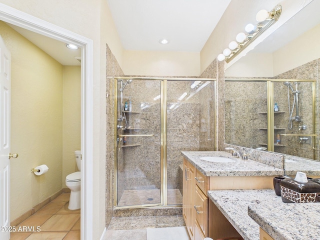 bathroom with toilet, a stall shower, tile patterned flooring, and vanity