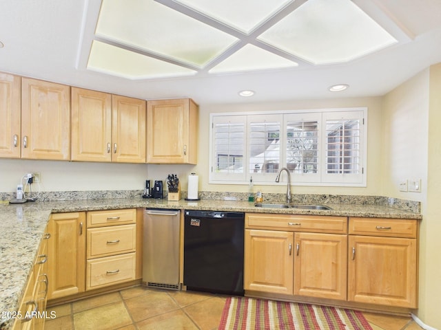 kitchen featuring recessed lighting, a sink, light stone counters, dishwasher, and light brown cabinets