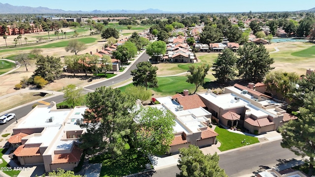 drone / aerial view featuring a residential view and golf course view