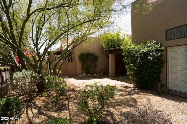 view of yard with a patio area and fence