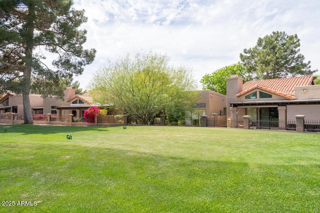view of yard with fence