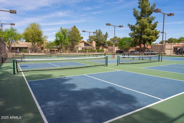 view of sport court with fence and community basketball court