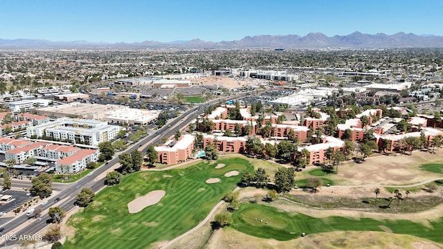 aerial view featuring a mountain view and view of golf course