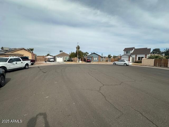 view of road featuring a residential view