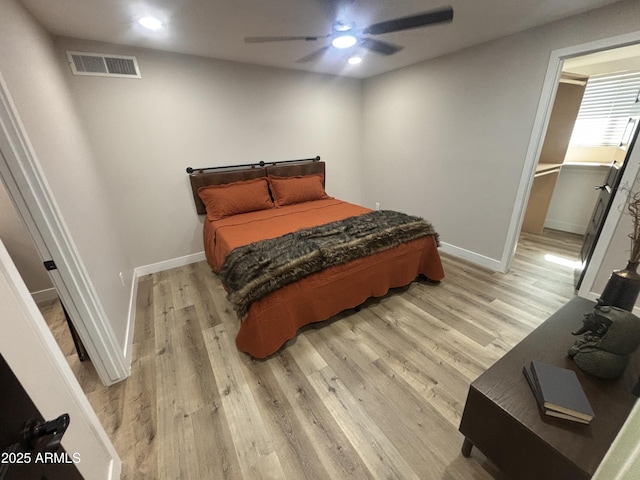 bedroom with light wood-style flooring, recessed lighting, a ceiling fan, visible vents, and baseboards