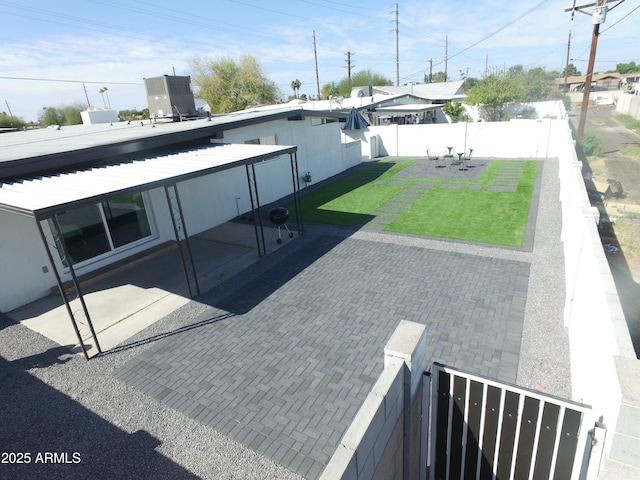 exterior space with a fenced backyard