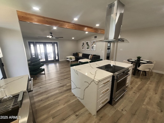 kitchen featuring vaulted ceiling with beams, visible vents, electric stove, light wood finished floors, and island exhaust hood