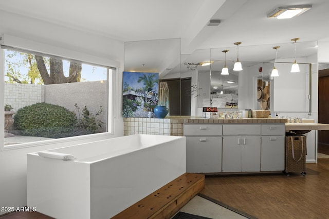 1522 W Myrtle Ave, Phoenix, AZ 85021 - kitchen with dark wood-style flooring and pendant lighting