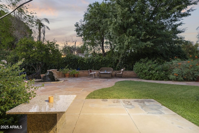 1522 W Myrtle Ave, Phoenix, AZ 85021 - patio terrace at dusk with a patio and a lawn